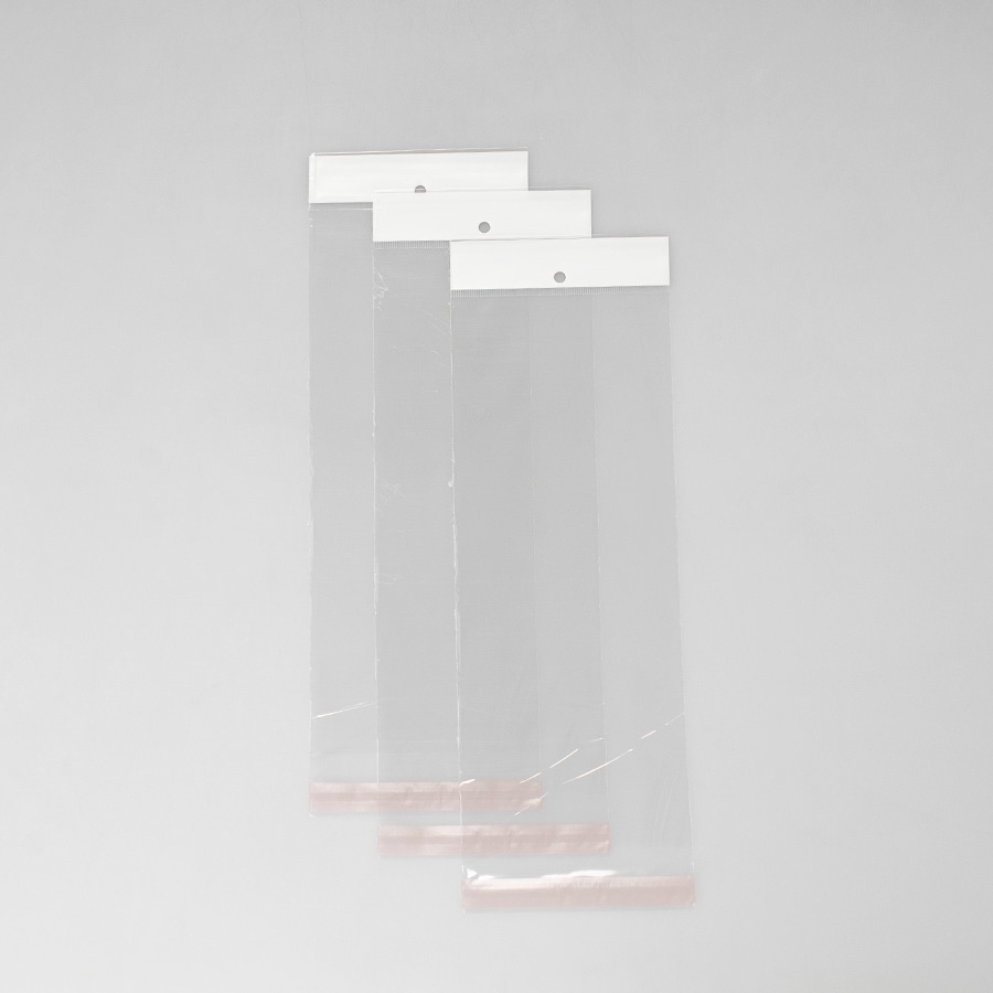 Bolsa de Celofán 11x27+3+3 Cm Adhesiva 100 Pz